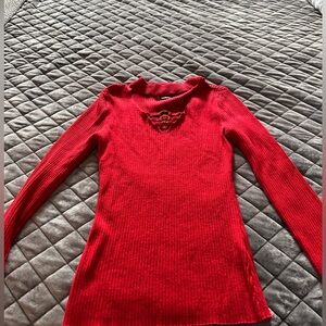 Red blouse/ sweater